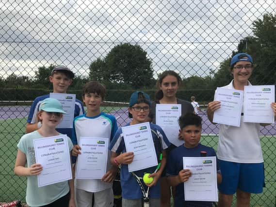 A number of Billingshurst Tennis Club members show off their accolades