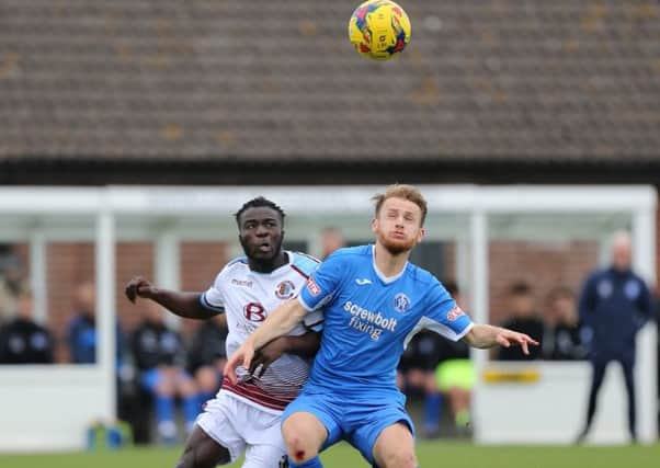 Daniel Ajakaiye competes for possession during Hastings United's weekend win away to Leiston. Picture courtesy Scott White