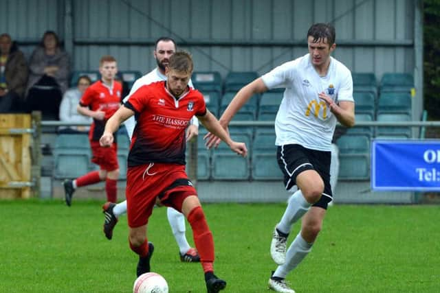 Action from Saturday's match between Hassocks and Eastbourne United