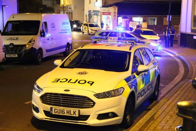 Police on the scene near Worthing Railway Station SUS-180926-105236001