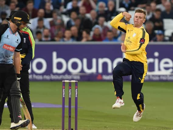 Mason Crane in action for Hampshire.