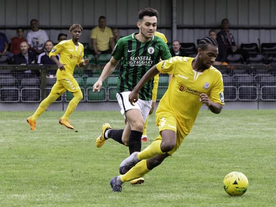 Recently released Burgess Hill Town forward Connor Tighe in action earlier in the season against Potters Bar Town. Picture by Chris Neal.