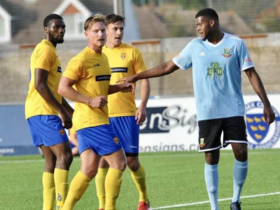 Action from Lancing's FA Cup clash against Hendon. Picture by Stephen Goodger