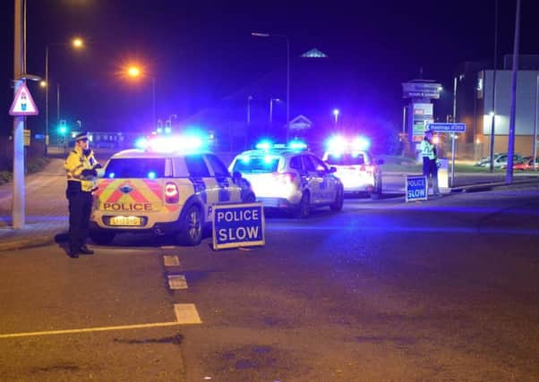 Armed police at the scene on the night of the shooting