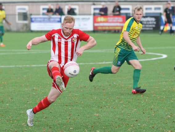 Action from Steyning's win against Walton & Hersham. Picture by Derek Martin