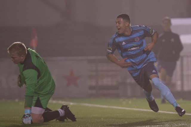 Bradley Campbell celebrates his first goal. Picture by Marcus Hoare