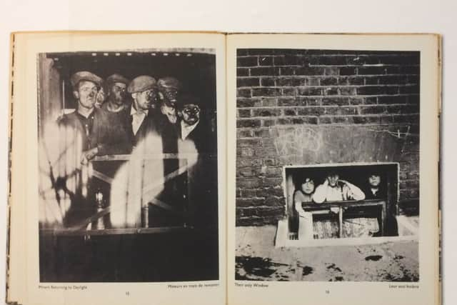 Miners and children pictured in Bill Brandt's The English at Home.JPG