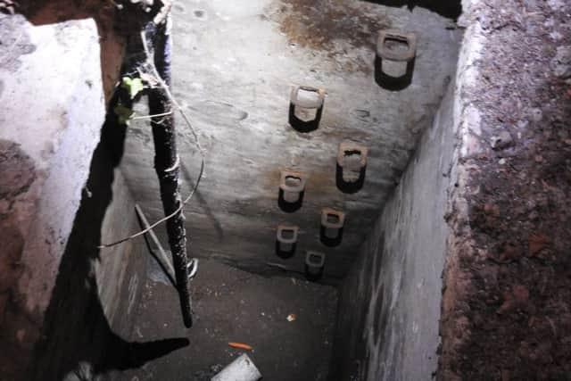 The boys lowered food and water down the 20ft pit for the badger (Photograph: RSPCA)