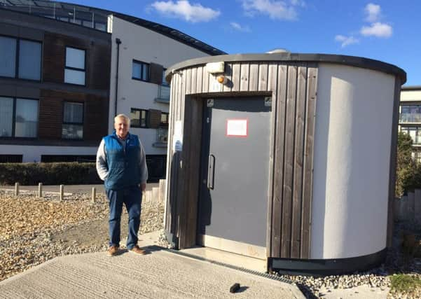 Chairman of the residents' association Mike Towns at the public toilet