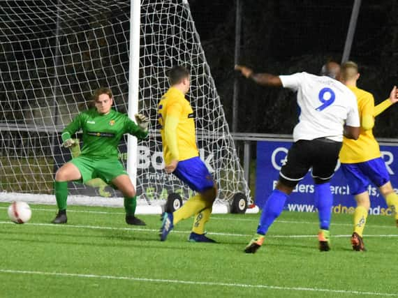 Action from Lancing's cup clash against Haywards Heath Town. Picture by Grahame Lehkyj