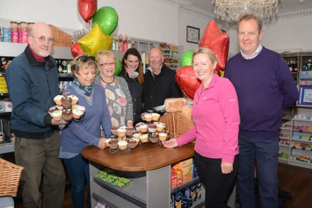 Volunteer Maggie Martin baked cakes for everyone to mark the occasion