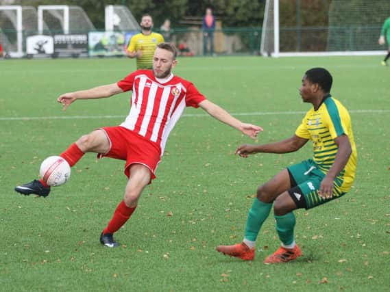 Action from Steyning's win over Walton & Hersham in the first round.