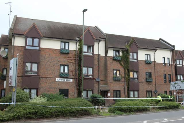 The stabbing happened in Burtons Court in Horsham