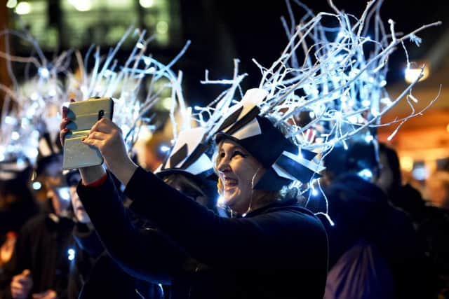 Thousands take part in the annual Burning the Clocks procession through the streets of Brighton to celebrate the winter solstice (
Photograph: Simon Dack

)