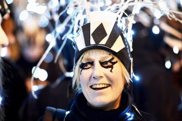 Thousands take part in the annual Burning the Clocks procession through the streets of Brighton to celebrate the winter solstice (
Photograph: Simon Dack

)