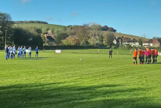 A minute's silence is observed by East Dean and Sompting