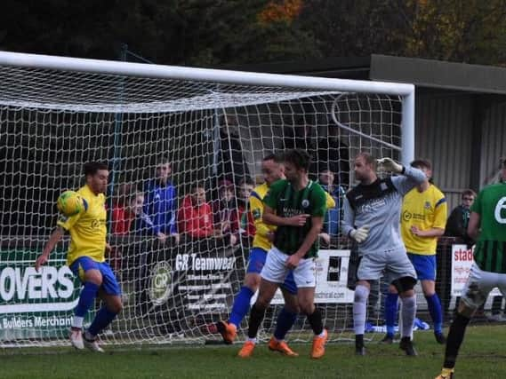 Action from Burgess Hill Town v Kingstonian. Picture by Chris Neal