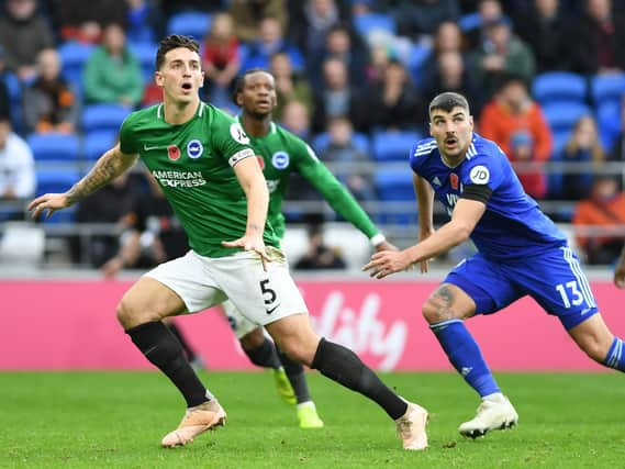 Lewis Dunk prepares to deal with a Cardiff cross. Picture by PW Sporting Photography