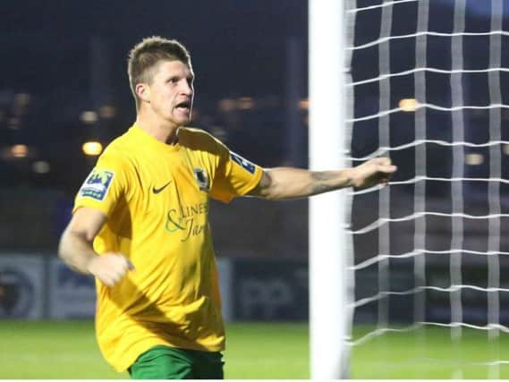 Chris Smith celebrates his winner against Potters Bar Town in the FA Trophy. Picture by John Lines