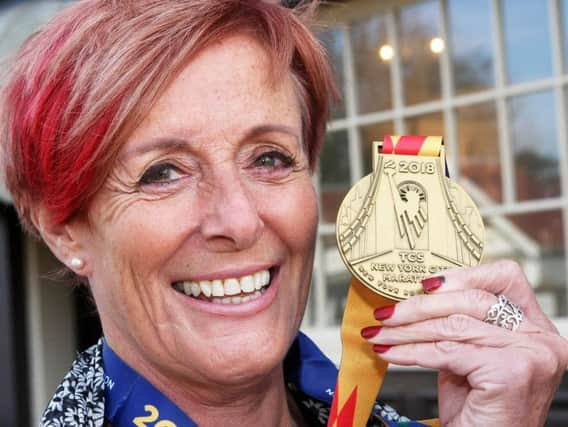 Sarah Jouault with her New York City Marathon medal. Photograph: Derek Martin/ dm111619a