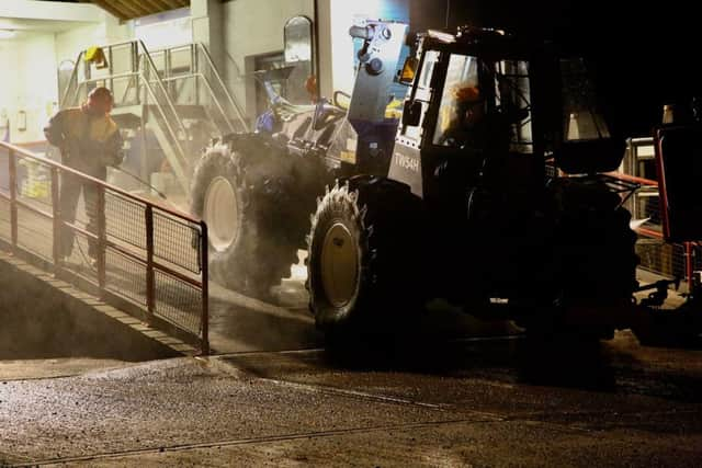 The Rye Harbour RNLI's launch tractor is washed down in readiness for the next 'shout'. Photo by Martin Bruce. SUS-181119-173704001