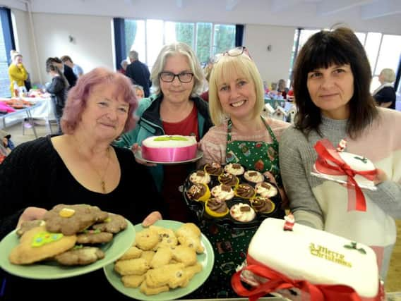 Member of Jamie Buckfield's family who baked cakes for the fair, from left, Marilyn Roberts, his grandma Win Terry, Yvette Barcock and his mum Tracey Terry. Picture: Kate Shemilt ks180573-2