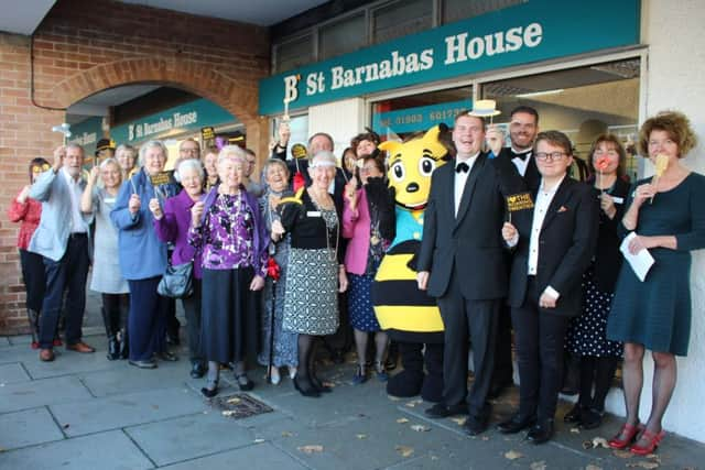 Durrington 20th party group outside the shop