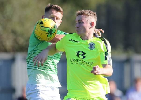 Adam Lovatt in action for Hastings United against Guernsey last month. Picture courtesy Scott White