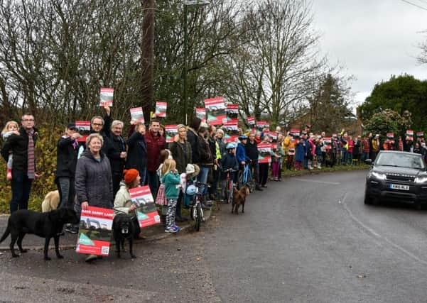 Henfield residents campaigning against the homes this week.  Photo by Julie Mitchell