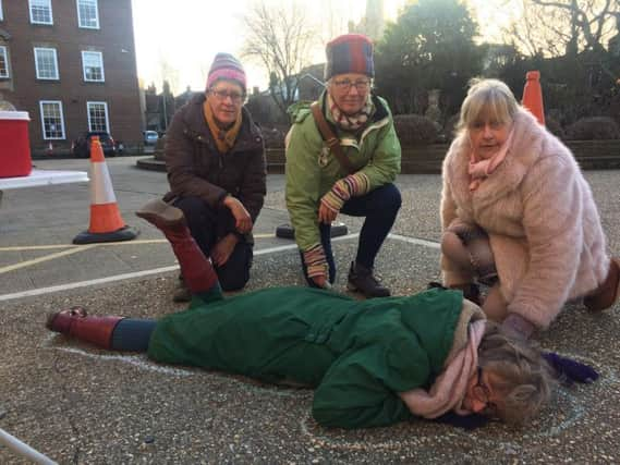 Sarah Sharp, chalk outline demonstration for cycle safety 11-12-18