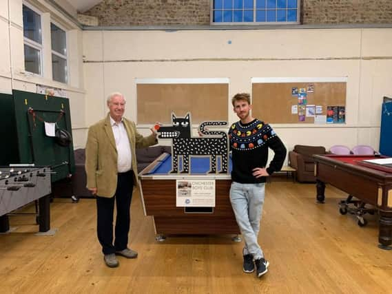 Chichester Boys' Club chairman Richard Hancock with artist Joachim