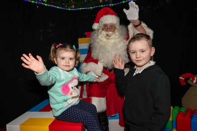 Youngsters from Rockinghorse get a taster of the grotto at Churchill Square