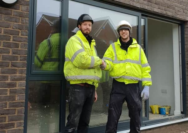 Andrew Taylor (right) alongside Stratton site agent Jack Green at Sovereign Harbour. SUS-181231-113423001