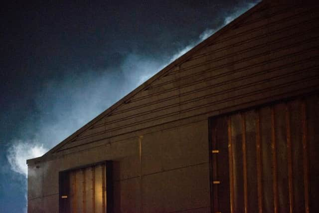 Smoke was seen billowing from the former Dreams bed store building