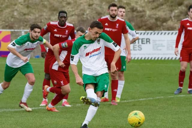 Harvey Whyte watches as Jimmy Muitt puts 2-0 up from the spot / Picture by Tommy McMillan