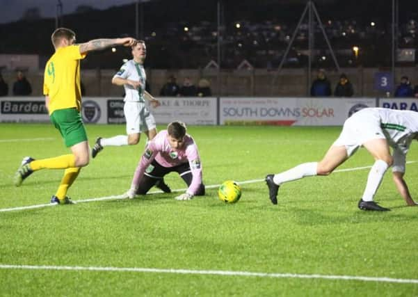 Horsham v Guernsey - Rob O'Toole strokes Horsham ahead. Picture by John Lines