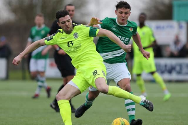 Jack Dixon on the ball against Ashford United. Picture courtesy Scott White