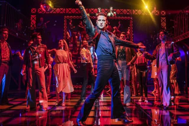 Richard Winsor as Tony with  the Cast of Saturday Night Fever - UK Tour (c) Pamela Raith Photography