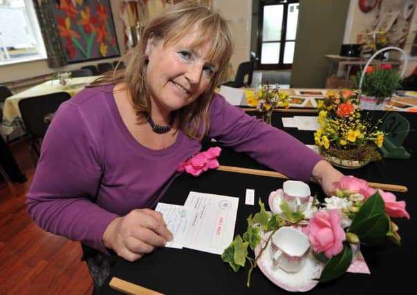 17/3/12- Crowhurst and District Horticultural Society Spring Flower Show.  Mary Boorman with her prize-winning entry. ENGSUS00120120319082051