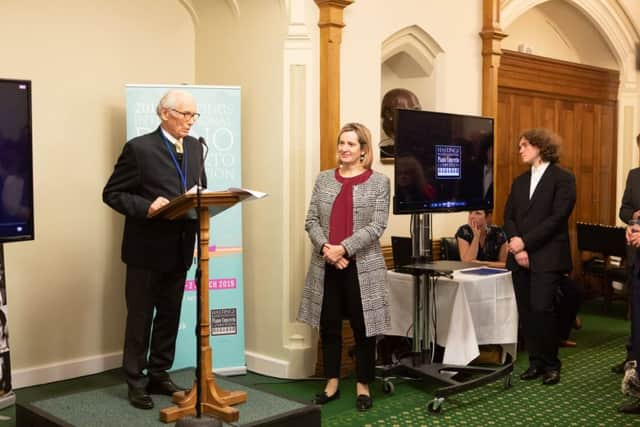 Hastings International Piano Concerto Competition Artistic Director Frank Wibaut, with Amber Rudd MP and 2018 competition Winner Roman Kosyakov. Photo by RG Studios. SUS-190124-113204001