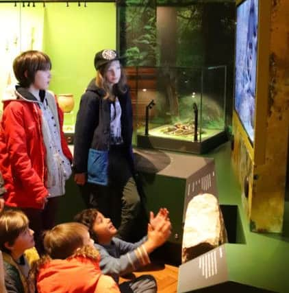 Children from St Luke's at the new archaeology gallery at Brighton Museum