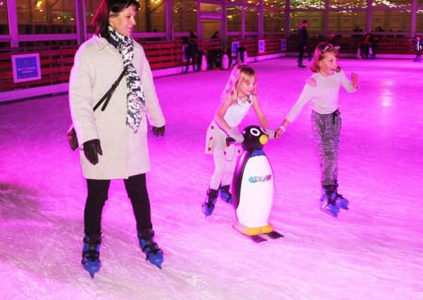 DM18113231a.jpg. Opening of Chichester Ice Rink in Priory Park. Photo by Derek Martin Photography. SUS-181130-185548008