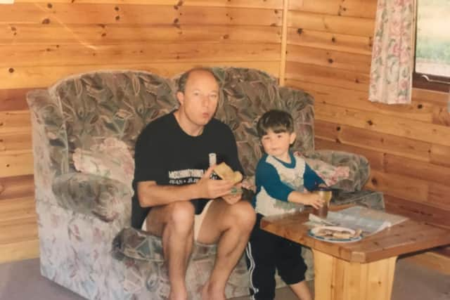 Charlie Moss, aged three or four, with his father Steve on holiday in the New Forest