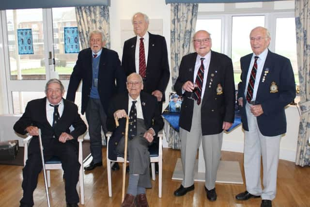 Flt Lt Jo John Oliver 'Jo' Lancaster, centre seated, with Roy Smith, left seated, back row, Flt Lt Harry Hacker, Wg Cdr John Bell, Flt Lt George Dunn and Flt Lt Hal Gardner