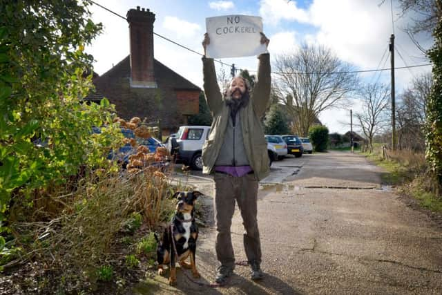 Paul Curtis and his dog, Boolu, pictured by Cedarwood House care home near Battle