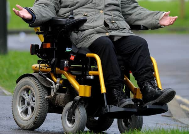 Crawley disabled woman Lynne Boyd is having her wheelchair taken away after Department of Work and Pension lost her form they asked her to hand in as part of a disability benefits shake up. SR1605474  Pic Steve Robards SUS-160220-123824001