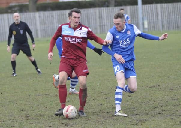 Liam Ward on the ball during Little Common's 2-0 defeat at home to Saltdean United. Picture by Simon Newstead