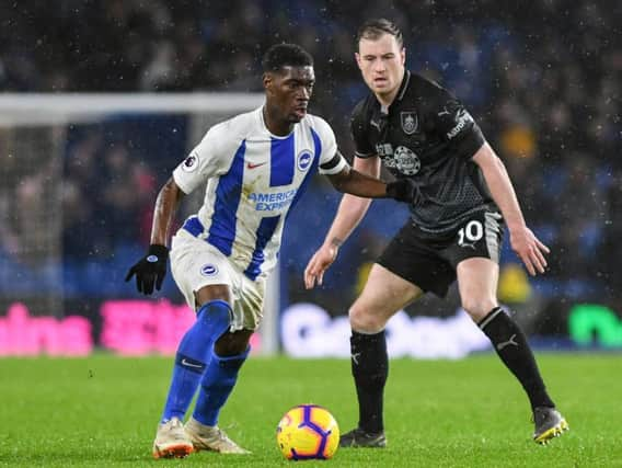 Ashley Barnes closes down Yves Bissouma. Picture by PW Sporting Photography