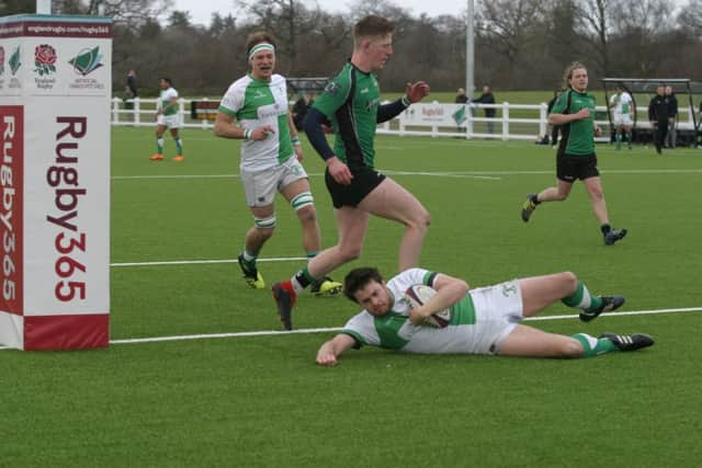 Johnny Ordidge scores against Heathfield & Waldron. Picture by Clive Turner