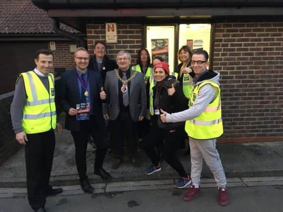 Surviving the Streets volunteers met with Hastings mayor Cllr Nigel Sinden, deputy mayor Cllr James Bacon and Cllrs Maya Evans and Paul Barnett outside the group's new base in St Leonards. SUS-191202-160012001